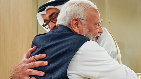 Prime Minister Narendra Modi being received by UAE President Mohamed bin Zayed Al Nahyan upon his arrival in Abu Dhabi.