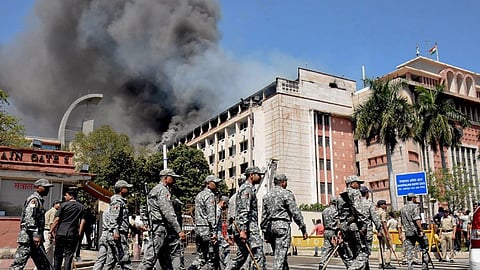 Smoke billows out after a fire broke out, at Madhya Pradesh Secretariat, in Bhopal, Saturday, March 9, 2024. 