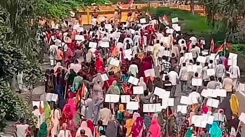 Hindu and Sikh refugees raise slogans during a protest against Delhi Chief Minister Arvind Kejriwal demanding an apology from him over his statements against the implementation of the Citizenship (Amendment) Act (CAA), near his residence at Civil Lines area, in New Delhi, Thursday, March 14, 2024. 