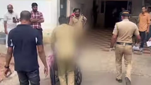 Injured Ali brought to medical college hospital on a wheel chair.