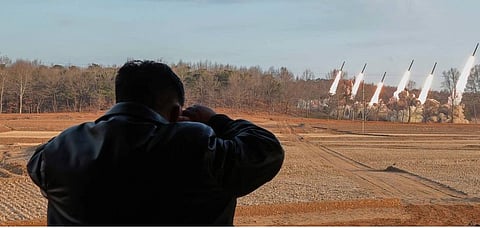 North Korea's Kim Jong Un supervises rocket launcher tests