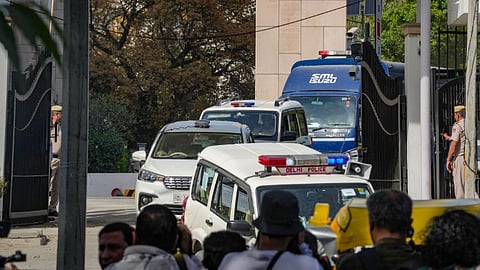 Delhi Chief Minister Arvind Kejriwal being taken to Tihar Jail after a court sent him to judicial custody till April 15 in connection with a money laundering case related to the Delhi liquor policy, in New Delhi, Monday, April 1, 2024. 