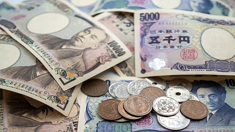Japan's currency falls to its weakest since 1990 against the dollar as the yen keeps yelping