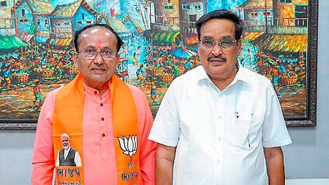 Gujarat BJP President C.R. Patil with party leader Mukesh Dalal after the latter was elected unopposed from Surat Lok Sabha seat, on Monday, April 22, 2024. 