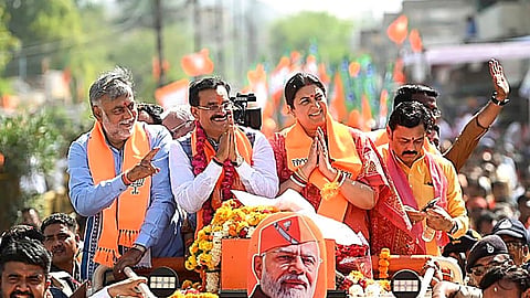 Union Ministers Smriti Irani and Prahlad Patel with BJP candidate VD Sharma during a rally before the latter files his nomination papers ahead of Lok Sabha elections, in Panna, Madhya Pradesh, Wednesday, April 3, 2024. 