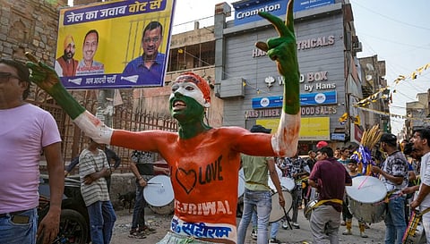 Blaring music, narrow lanes packed with people mark Kejriwal's roadshow in Delhi