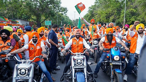 Sikh community people take part in a bike rally, extending support to Prime Minister Narendra Modi, amid Lok Sabha polls, in New Delhi, Sunday, May 12, 2024. 