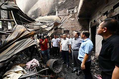 A fire in an apartment building in Hanoi, Vietnam, kills 14 people and injures 6 