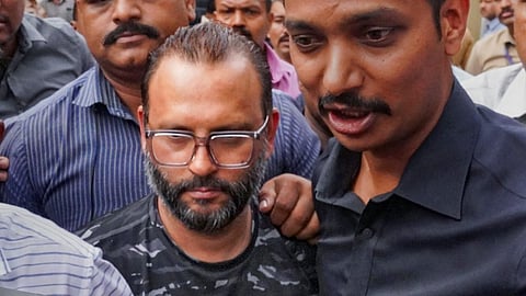Builder Vishal Agarwal is brought at Pune Police Commissioner's office after his arrest, in Pune, Tuesday, May 21, 2024.
