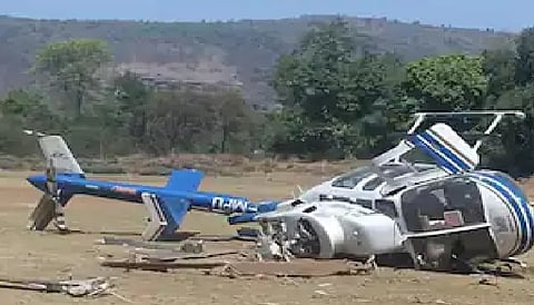 The pilot of a private helicopter scheduled to pick up a Shiv Sena (UBT) leader was injured after it tilted during landing in Maharashtra's Raigad district on Friday, a police official said.