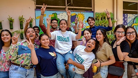 Students react after the Central Board of Secondary Education (CBSE) declared the board exam results.