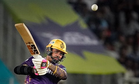 Kolkata Knight Riders player Sunil Narine plays a shot during the Indian Premier League (IPL) 2024 T20 cricket match between Kolkata Knight Riders and Sunrisers Hyderabad at the Narendra Modi Stadium, in Ahmedabad, Tuesday, May 21, 2024.
