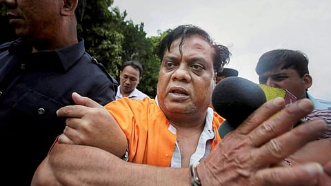 Mumbai underworld gangster Chhota Rajan escorted by Indonesian police after being arrested in Bali in 2015.