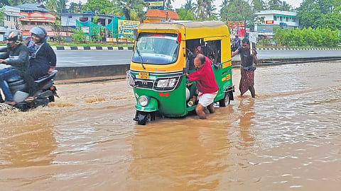 Waterlogged and damaged roads in Kerala capital