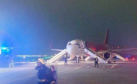 A Bengaluru-Kochi Air India Express flight makes an emergency landing at Bengaluru Airport after its right engine caught fire soon after take-off, in the early Sunday morning, May 19, 2024.