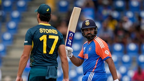 India's captain Rohit Sharma celebrates after scoring 50 runs against Australia during ICC Men's T20 World Cup cricket match at Darren Sammy National Cricket Stadium in Gros Islet, Saint Lucia, Monday, June 24, 2024.