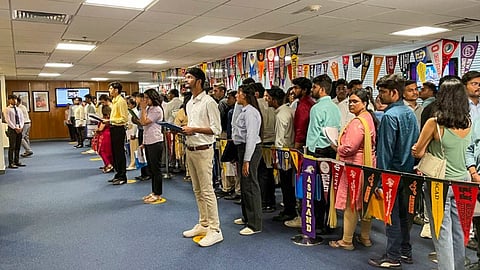 Indian students who have received their visas for studying at their respective universities in various American states, at a lobby of the consular office of the US Embassy on the Student Visa Day, in New Delhi, Thursday, June 13, 2024.