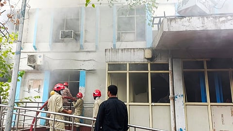 Firefighters douse a fire which broke out in the emergency building of the Safdarjung Hospital, in New Delhi, Tuesay, June 25, 2024.