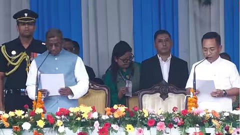 Sikkim Krantikari Morcha (SKM) president Prem Singh Tamang (R) sworn in as CM of Sikkim