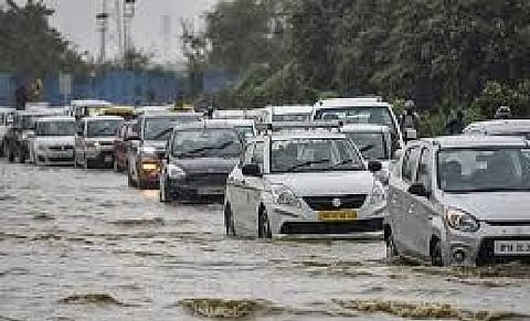 IMD issues red alert as heavy rain causes traffic snarls, waterlogging in Delhi 