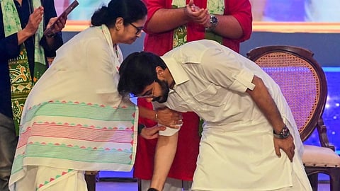 Noted film actor Prasenjit Chatterjee seeks blessings of West Bengal Chief Minister Mamata Banerjee during an event to commemorate legendary Bengali film actor Uttam Kumar's death anniversary, in Kolkata,Wednesday, July 24, 2024. 