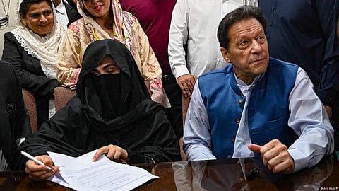 Imran Khan with his wife Bushra Bibi.