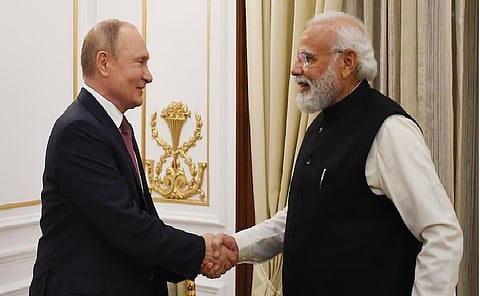 Putin (L)  , Modi (R)