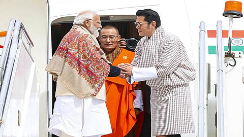 PM Narendra Modi, Bhutan King Jigme Khesar Namgyel Wangchuck and his PM Tshering Tobgay (C)