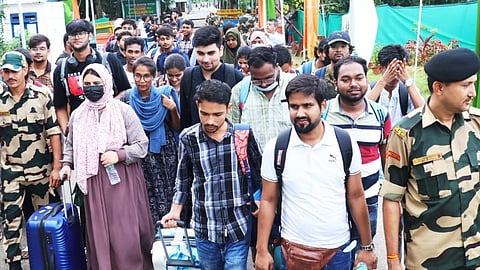 Students, who are studying in Bangladesh, upon their arrival following protest against the government job quota, at the Akhura Check post, in Agartala, Saturday, July 20, 2024. 