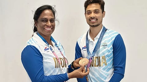 Indian Olympic Association President PT Usha with Indian sports shooter Sawapnil Kusale after the latter won bronze medal in the 50m rifle 3 positions event at the 2024 Summer Olympics.