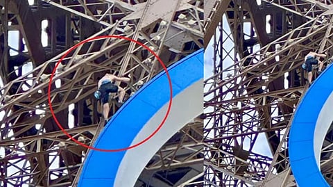 Man seen climbing Eiffel Tower, prompting evacuation hours before Olympics closing ceremony