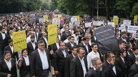 Lawyers of Calcutta High Court stage a protest against alleged sexual assault and murder of a postgraduate trainee doctor, in Kolkata, Monday, August 19, 2024. 