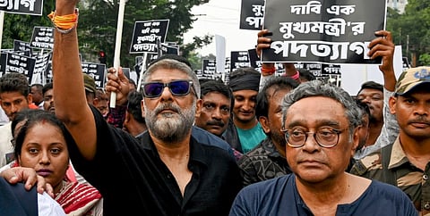 BJP leader Swapan Dasgutpta, director Vivek Agnihotri and others during a protest rally against the recent alleged rape and murder of a woman trainee doctor of RG Kar Medical College and Hospital, in Kolkata, Wednesday, Aug. 21, 2024.