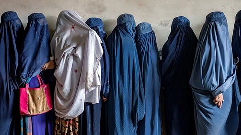 The Taliban publish vice laws that ban women's voices and bare faces in public