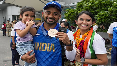 Indian hockey mid-fielder Manpreet Singh with his family