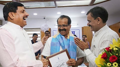 Union Minister of State for Minority Affairs George Kurian being greeted by Madhya Pradesh Chief Minister Mohan Yadav and BJP State President VD Sharma after he was elected as Rajya Sabha member, in Bhopal, Tuesday, Aug. 27, 2024.