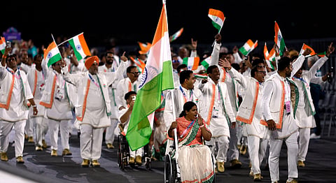 Indian contingent led out by Sumit, Bhagyashri at Paralympic opening ceremony    	