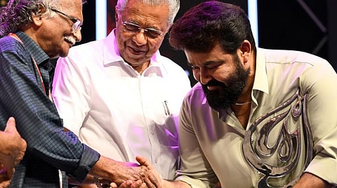 Actor Mohanlal receives Sreekumaran Thampi Foundation award from Kerala CM Pinarayi Vijayan in presence of Lyricist and music director Sreekumaran Thampi in Thiruvananthapuram.