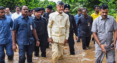 Andhra Pradesh Chief Minister N. Chandrababu Naidu visits a flood-affected area at Bhavanipuram, in Vijayawada, Monday, Sept. 2, 2024.