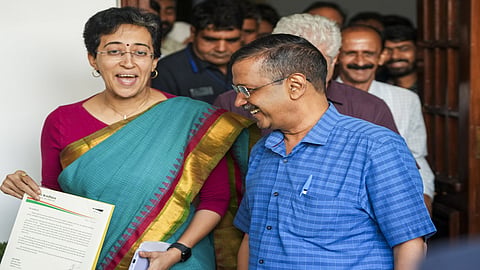 AAP spremo A Kejriwal with Delhi CM Atishi