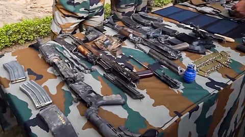 Arms and ammunition recovered from terrorists who were killed in an encounter with security personnel, in Akhnoor area of Jammu & Kashmir, Tuesday, Oct. 29, 2024. 