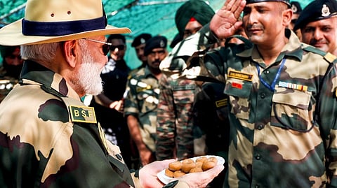 Prime Minister Narendra Modi with BSF jawans during Diwali celebration at Lakki Nala in Sir Creek area in Kutch, Gujarat.