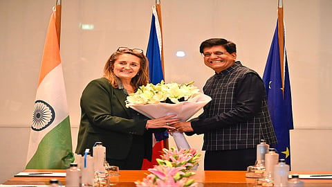 French foreign trade minister Sophie Primas is being greeted by Commerce Minister Piyush Goyal