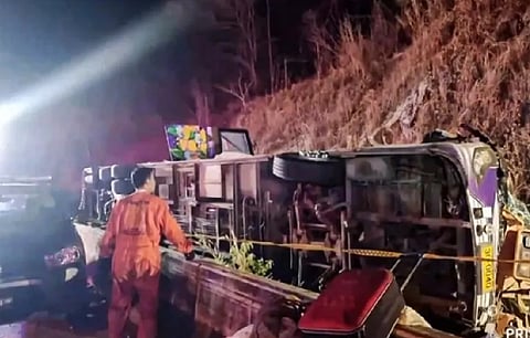 A chartered bus overturned in eastern Thailand early Wednesday morning, killing 18 people and injuring 31, officials said.