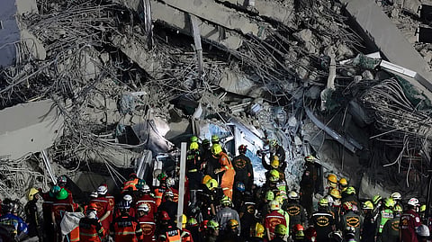 Emergency rescue teams on Sunday began trickling into the area of Myanmar hardest hit by a massive earthquake 