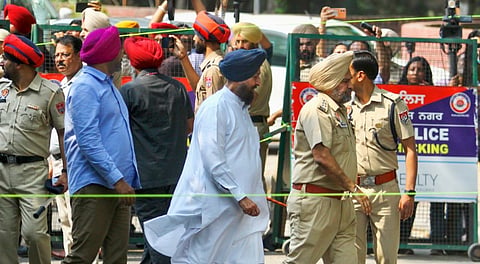 Leader of Opposition in Punjab Assembly Partap Singh Bajwa arrives at the Cyber Cell office for questioning over his '50 bombs' remarks.