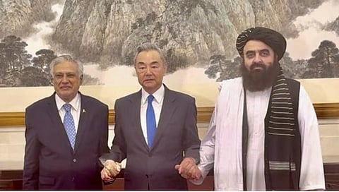 Pakistan's Deputy Prime Minister/Foreign Minister Ishaq Dar, Chinese Foreign Minister Wang Yi, and Acting Foreign Minister of Afghanistan Amir Khan Muttaqi