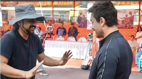 director RS Prasanna  and  Aamir Khan