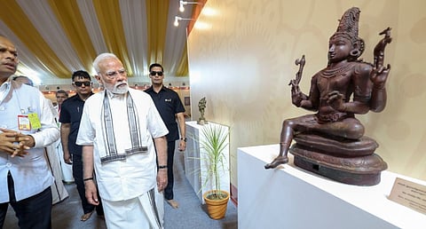 Prime Minister Narendra Modi visits an exhibition at Aadi Thiruvathirai Festival at Gangaikonda Cholapuram, in Ariyalur district of Tamil Nadu. 