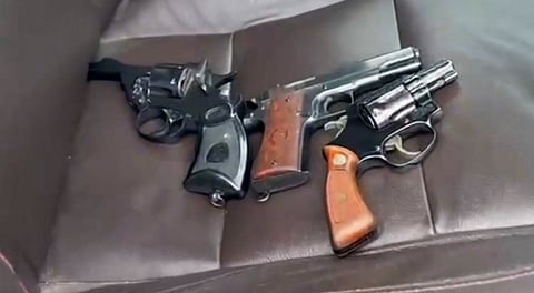 Pistols in a vehicle after AAP MLA Harmeet Singh Pathanmajra allegedly escaped police custody following firing, in Karnal, Tuesday, Sep. 02, 2025.